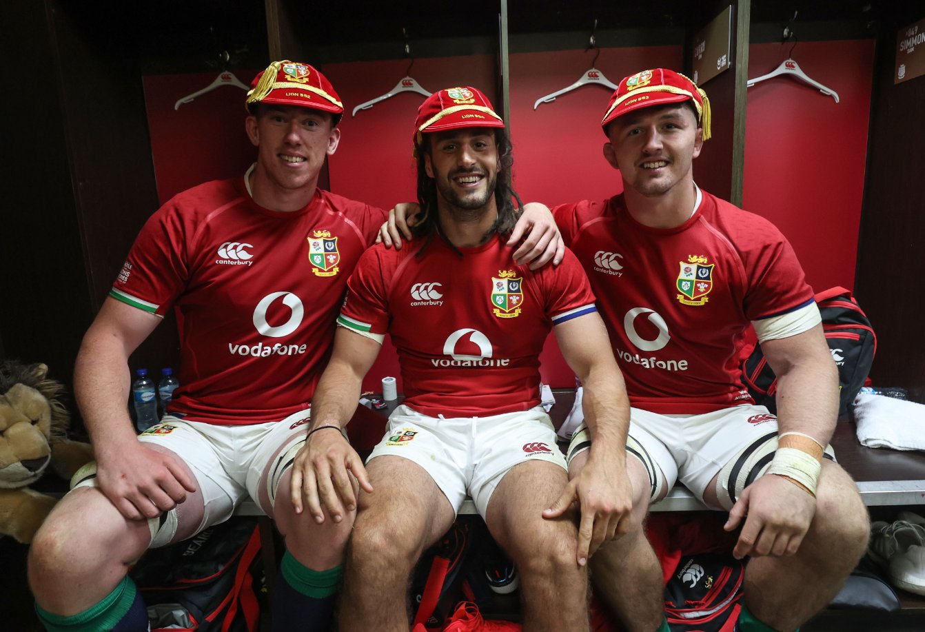 Adam Beard, Josh Navidi and Tom Currey pose in there new British and Irish Lions Honour Caps