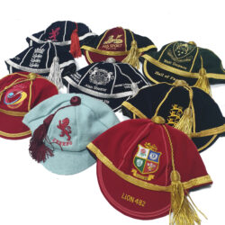honour caps with tassels including England cricket and Welsh Rugby caps.