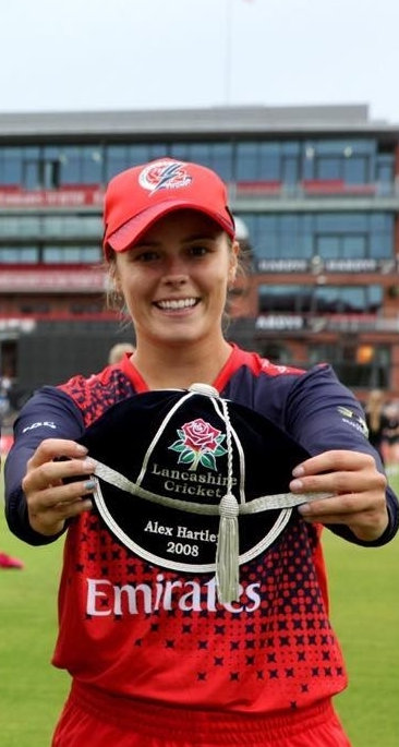 Alex Hartley with her Lancs CCC county cap.