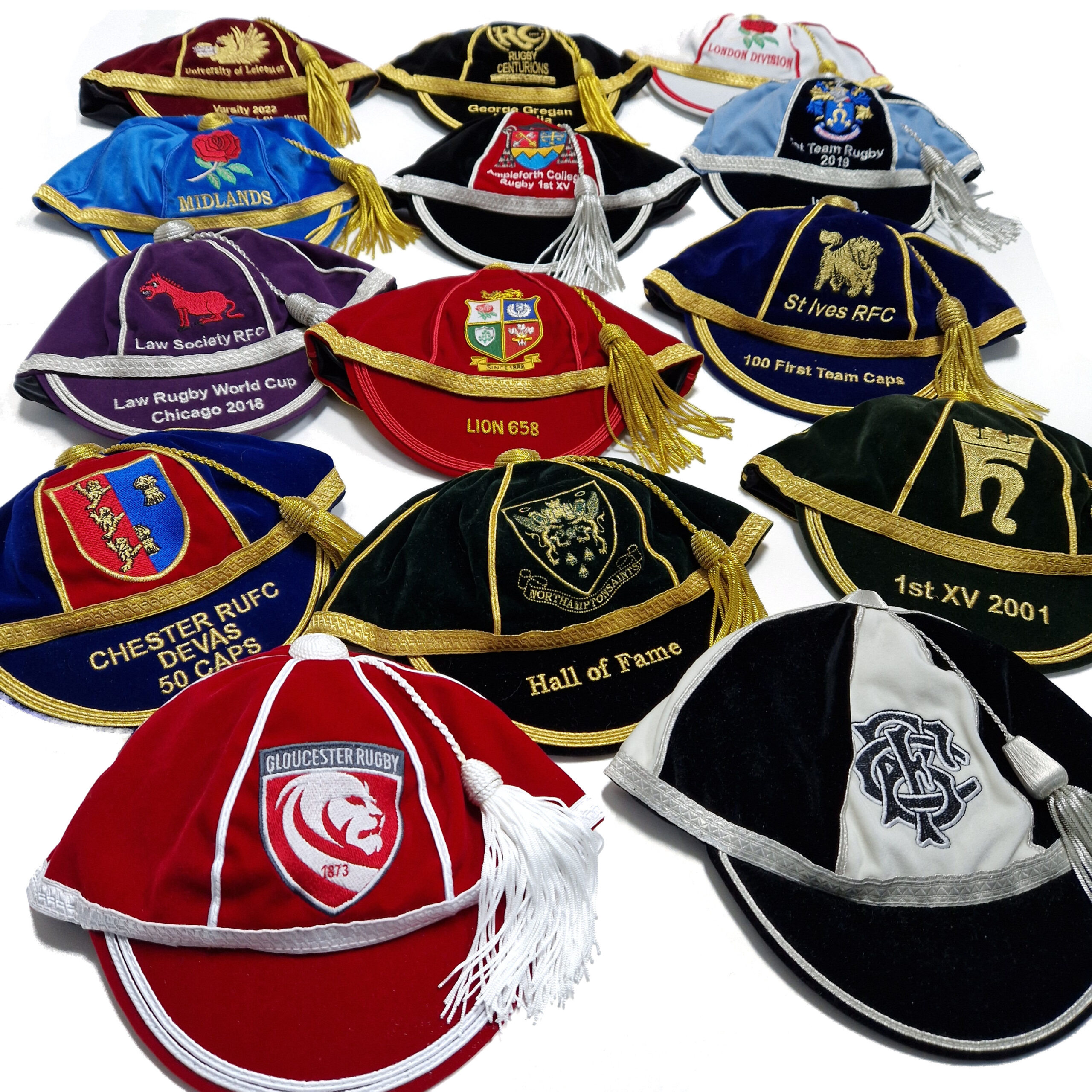 A range of our presentation or honours caps in neat columns showcasing the range of clubs and teams we support with awards evenings and celebrating achievements.